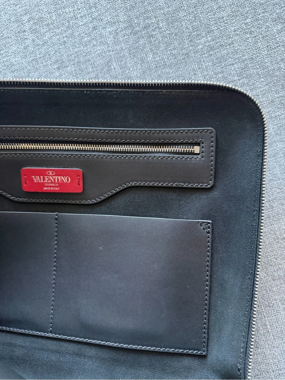 Valentino Garavani VLTN Black Leather Zip Pouch with Stud Accents